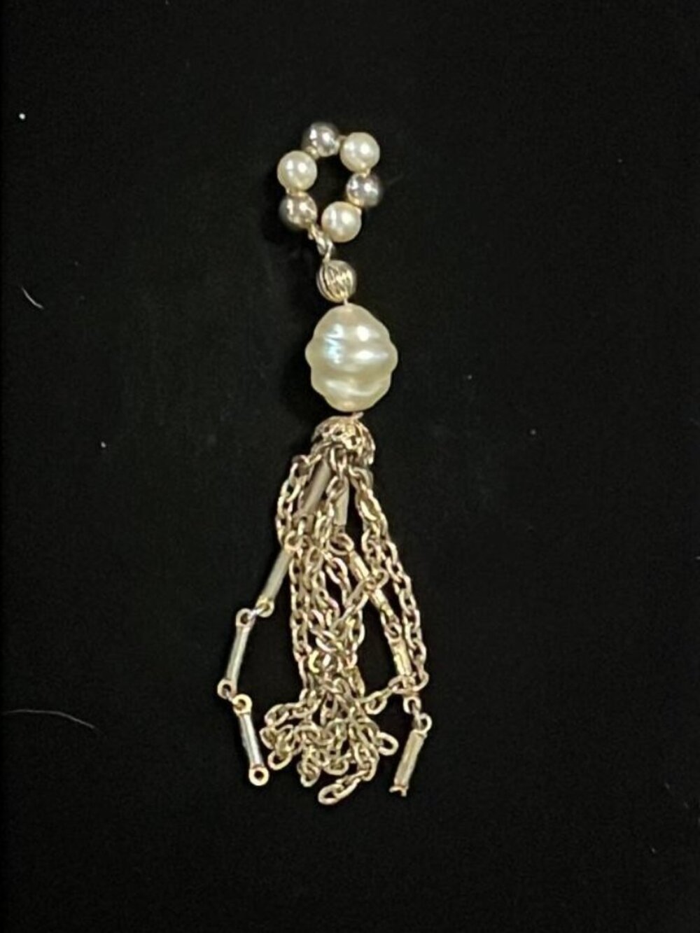 Gold Tone and Faux Pearl Loop with Twist Faux Pearl and Gold Tone Tassel Pendant